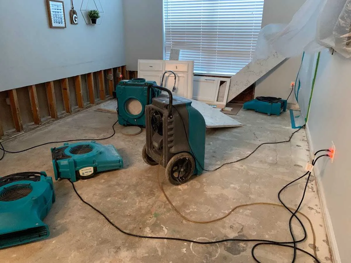 Dehumidifier in flood-cut room for Water Damage Restoration in Addison
